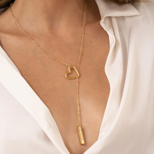 Collar y pendientes de pajarita de corazón