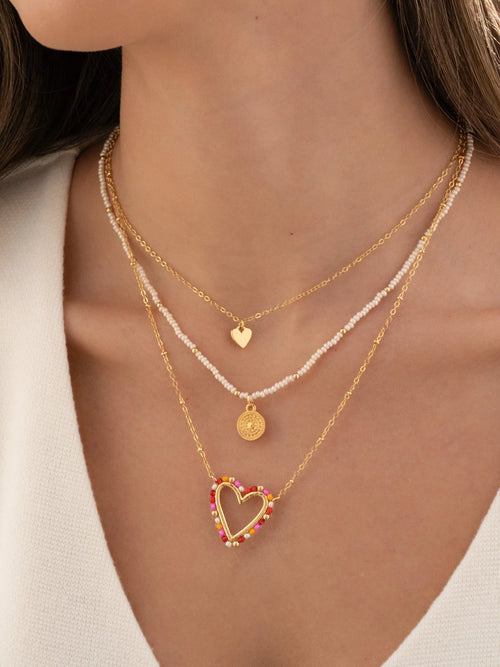 Conjunto de collar y pendientes de corazón